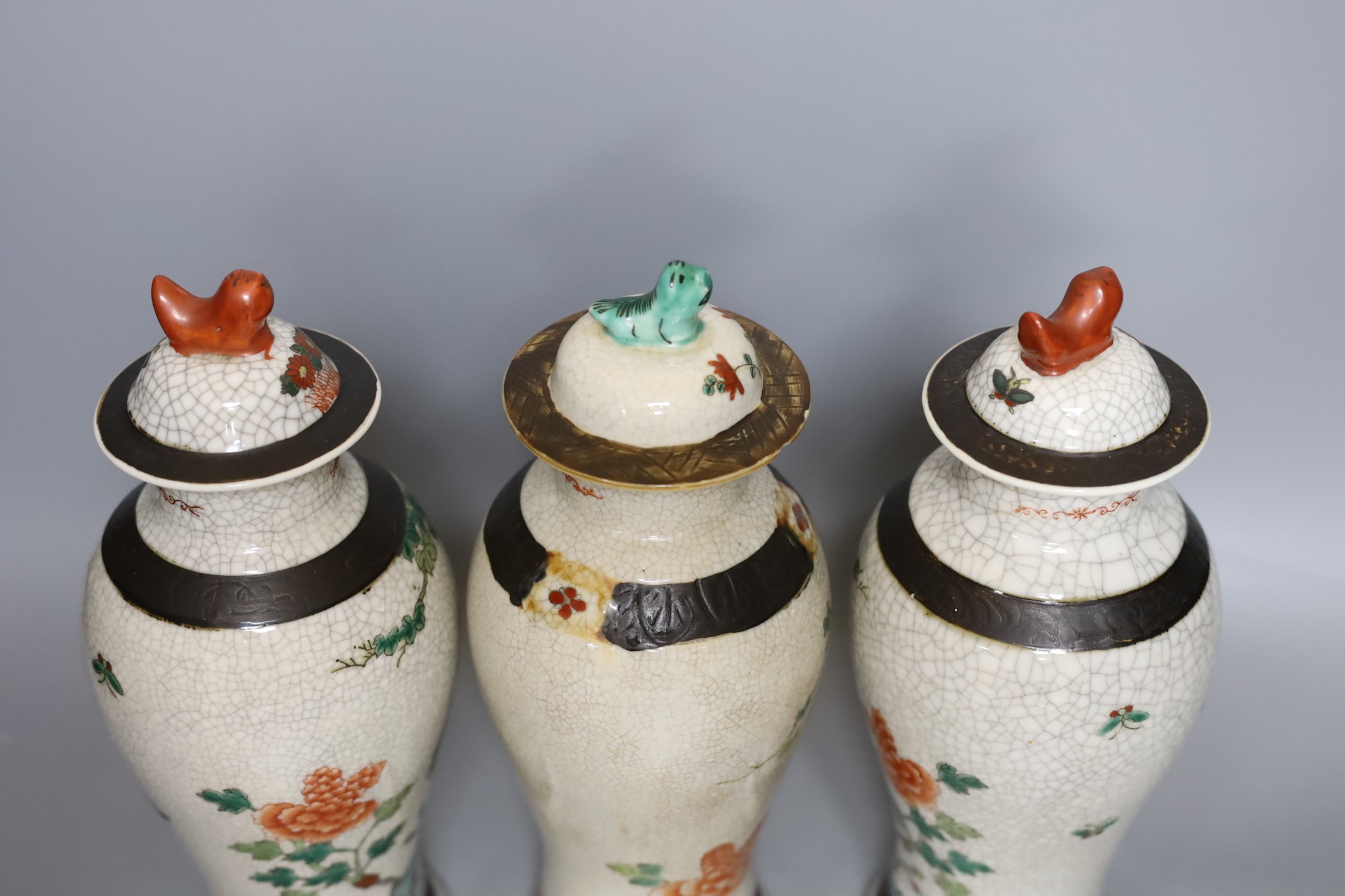 Three Chinese crackleware jars and covers, 26cm